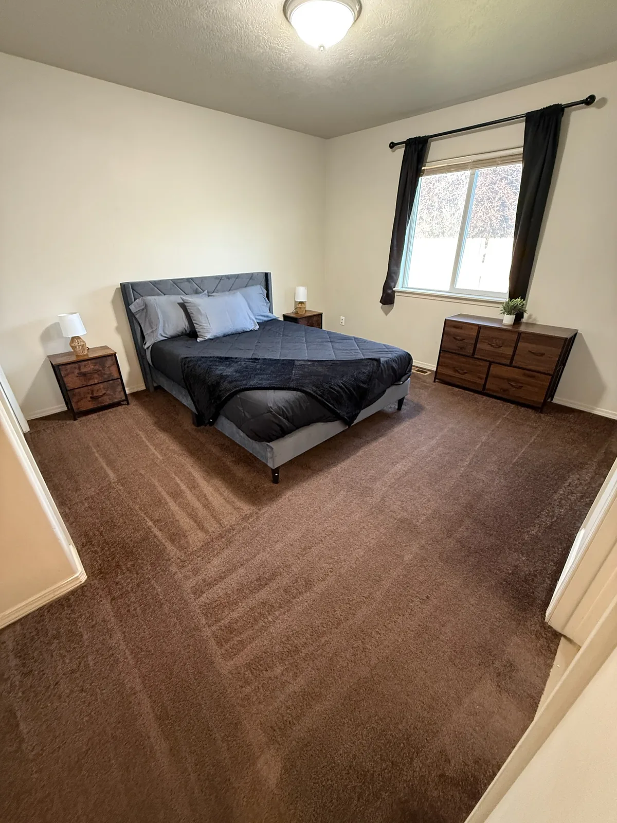 Freshly vacuumed bedroom after cleaning
